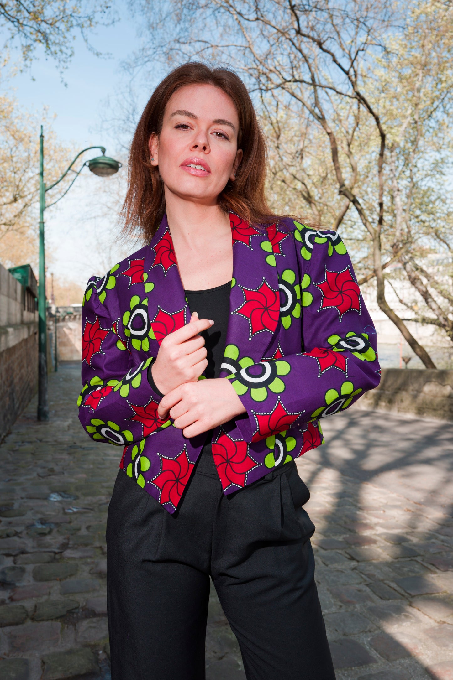 Zambarau, a rich colored jacket and its black trouser