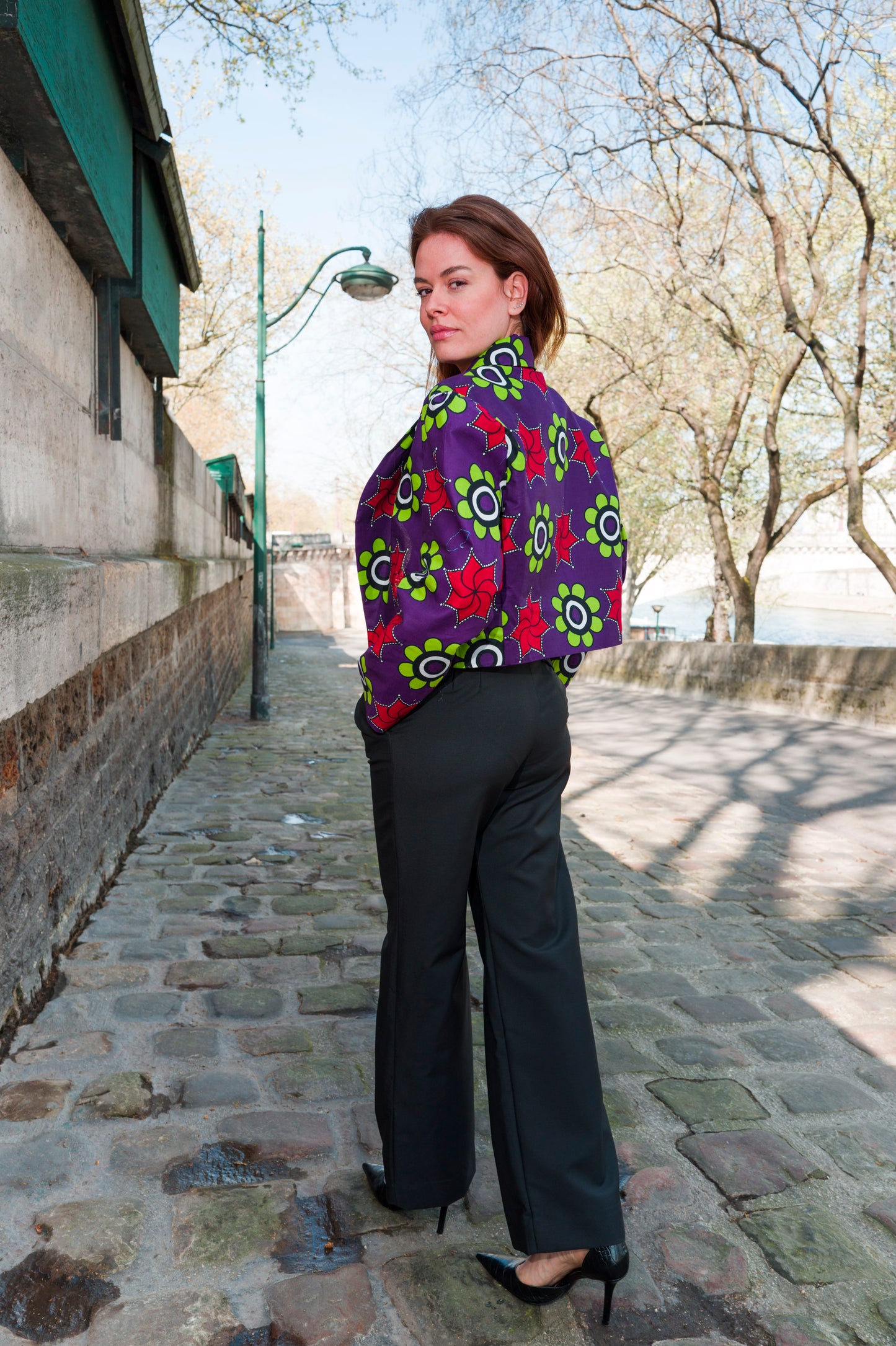 Zambarau, a rich colored jacket and its black trouser